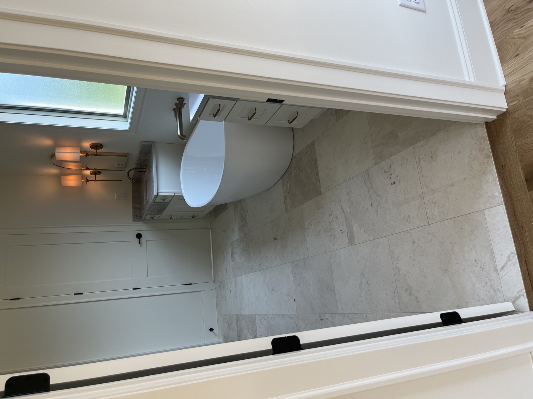 Spa bath · freestanding tub & stone floor